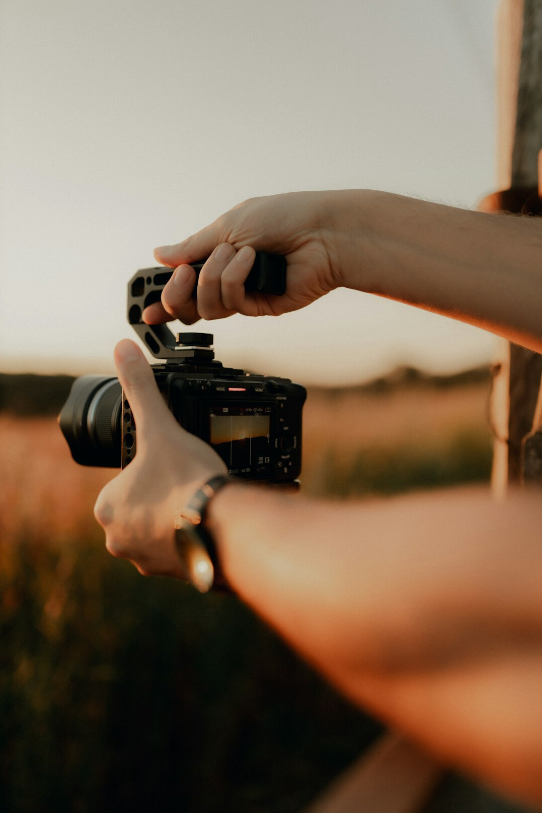 filmmaker with camera outdoors